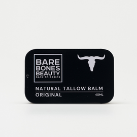 A black rectangular tin from Bare Bones Beauty Australia, labeled "Original Tallow Balm 40mL," features a white cattle skull and offers a natural, multipurpose skincare essential made with tallow balm.