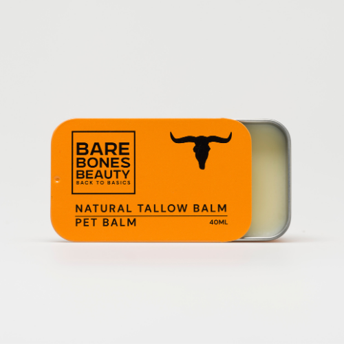 A rectangular tin with a bright orange lid labeled "Bare Bones Beauty Australia Pet Balm 40ml." The partially open lid reveals the pale balm inside—ideal for soothing cracked pet pads with natural tallow.