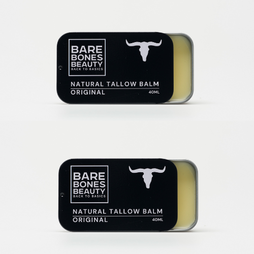Two Dynamic Duo Pack tins from Bare Bones Beauty Australia, each open to reveal a pale balm inside. Black lids feature a bull head graphic and white text on a white background—a perfect pair for natural, nourished skincare.