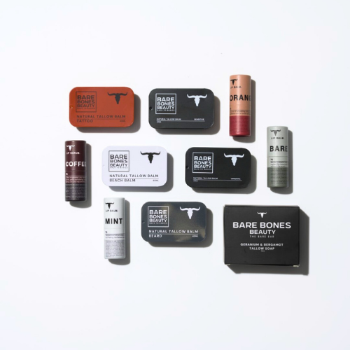 
                  
                    A flat lay of Bare Bones Beauty Australia’s EVERY SINGLE BONE – Bundle, featuring tallow balm and lip balm in tins and tubes labeled Coffee, Mint, Orange, and Beach Balm, arranged neatly on a light gray background.
                  
                
