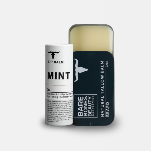 
                  
                    A Bare Bones Beauty Australia Tallow Balm & Lip Balm Bundle features a white mint lip balm tube beside a partially open rectangular tin, revealing natural skin care balm inside.
                  
                